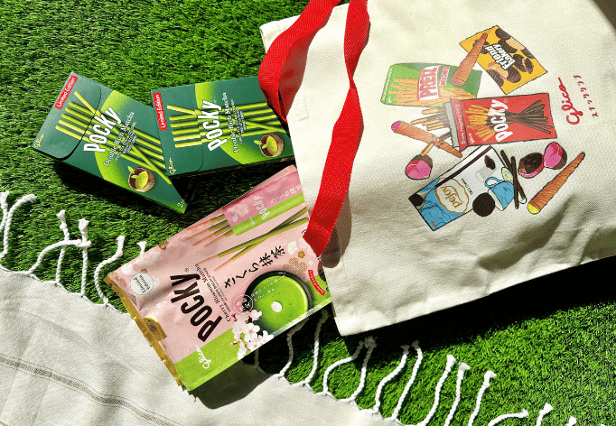 Pocky Double Rich Matcha and Cherry Blossom Matcha coming out from the Glico tote bag